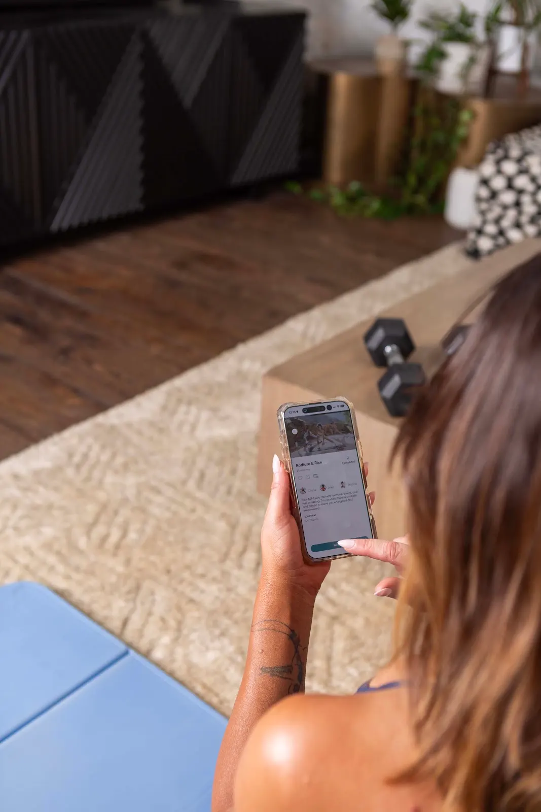 Tone It Up workout library on a phone